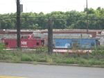 Norfolk Southern and a Conrail Caboose together
